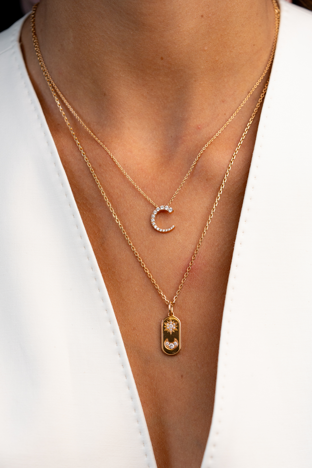 Pink Gold Necklace with a Sun and Moon