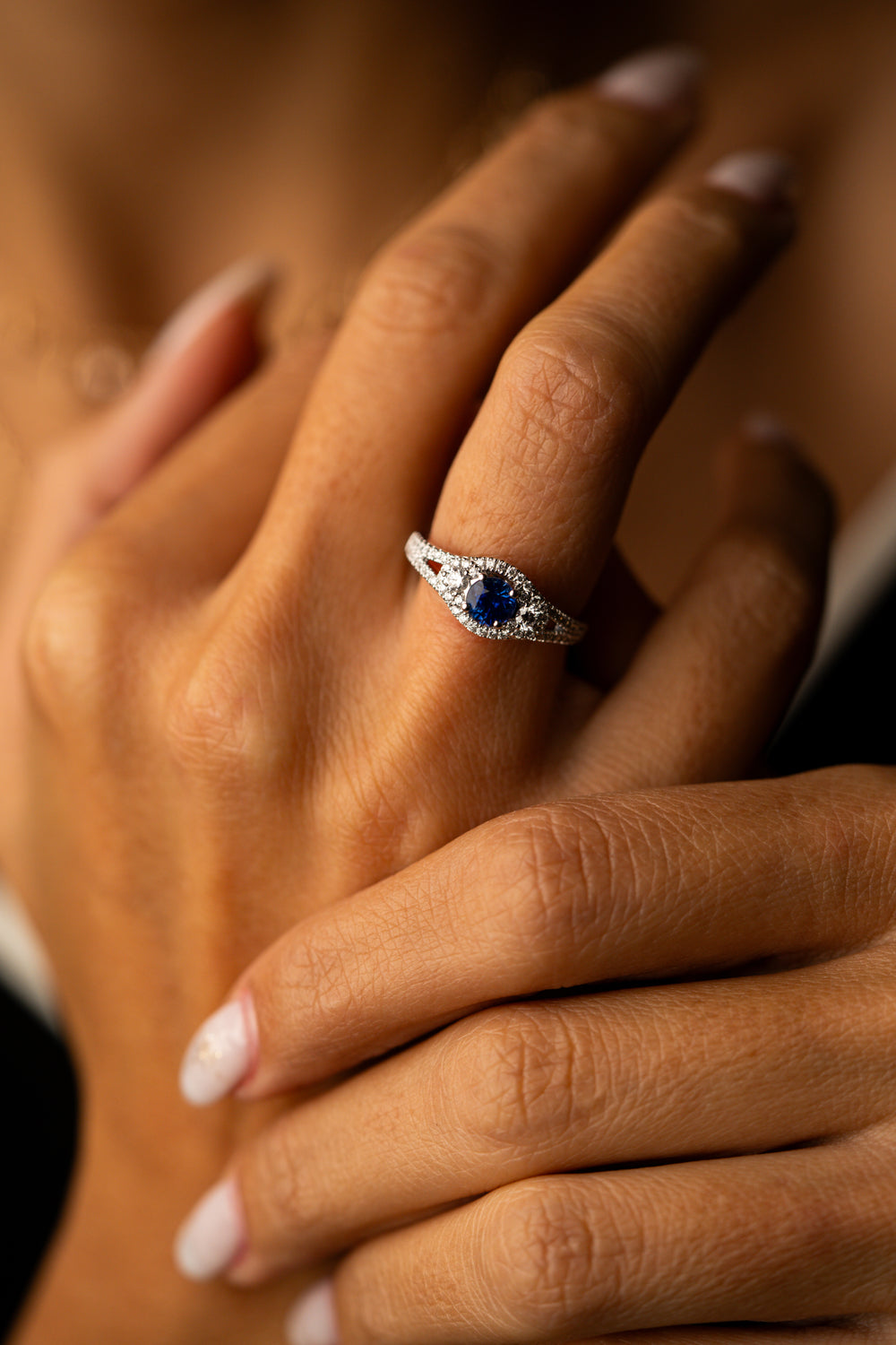 White Gold Engagement Ring with Diamonds and Sapphire