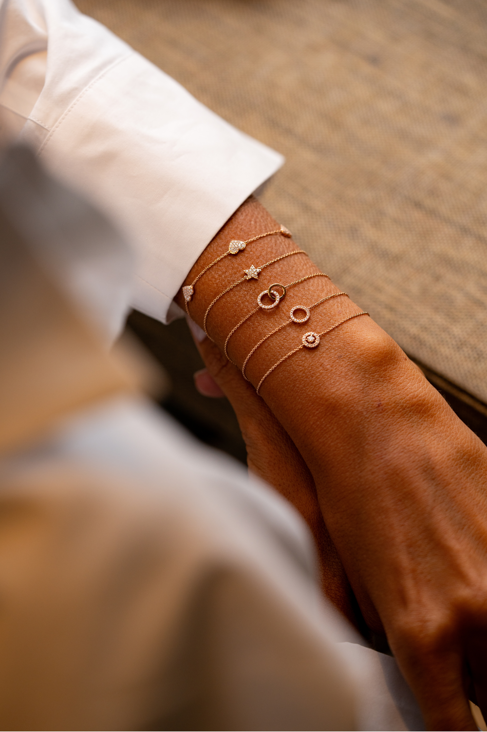 Pink Gold Circle with a Diamond in the Centre and Diamonds