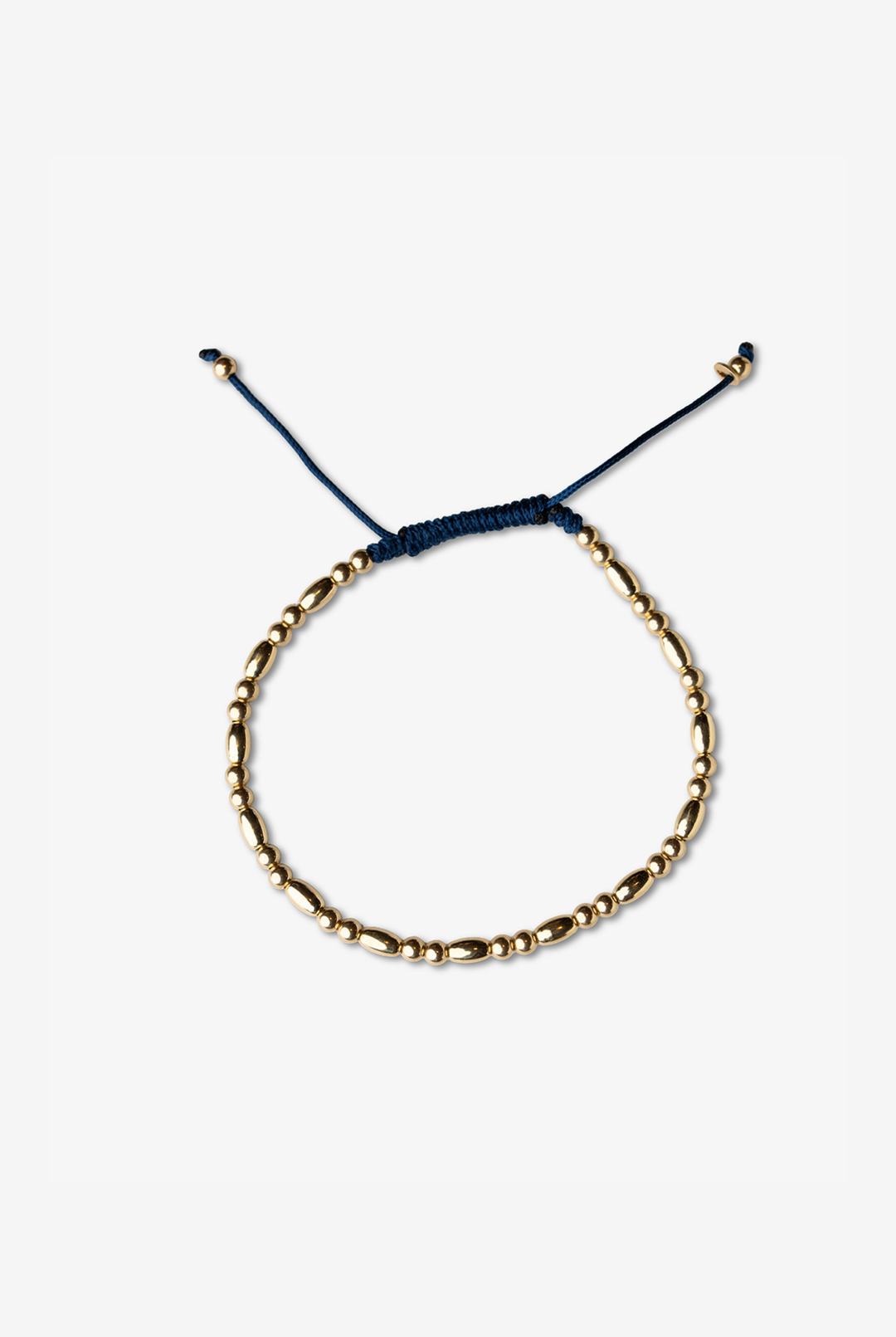 Pulseira em ouro amarelo com algodão azul