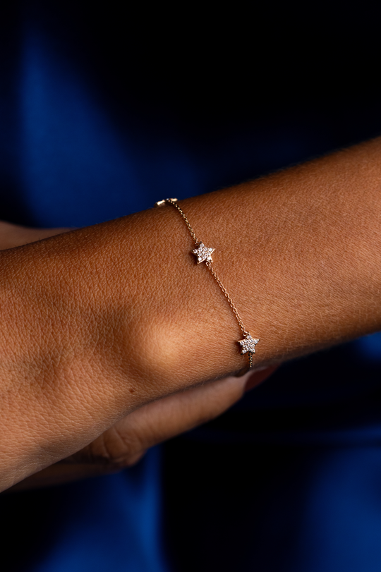 Pulseira de malha com 3 estrelas em ouro rosa e diamantes
