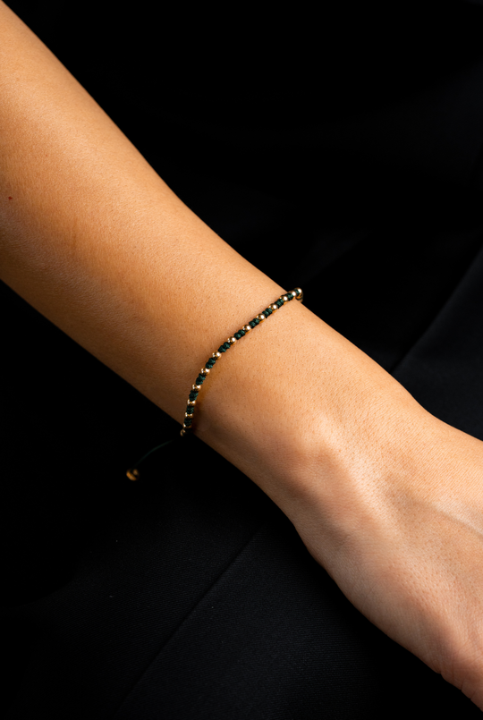 Pulseira às bolinhas em ouro amarelo com algodão verde escuro