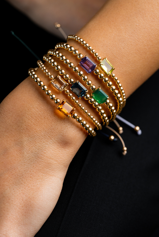 Pulseira em ouro amarelo com peridoto