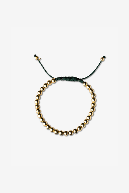 Pulseira às bolinhas em ouro amarelo com algodão verde escuro