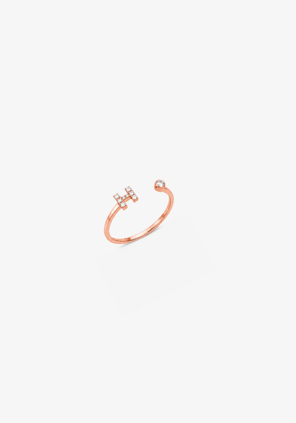 Anel em ouro rosa letra H